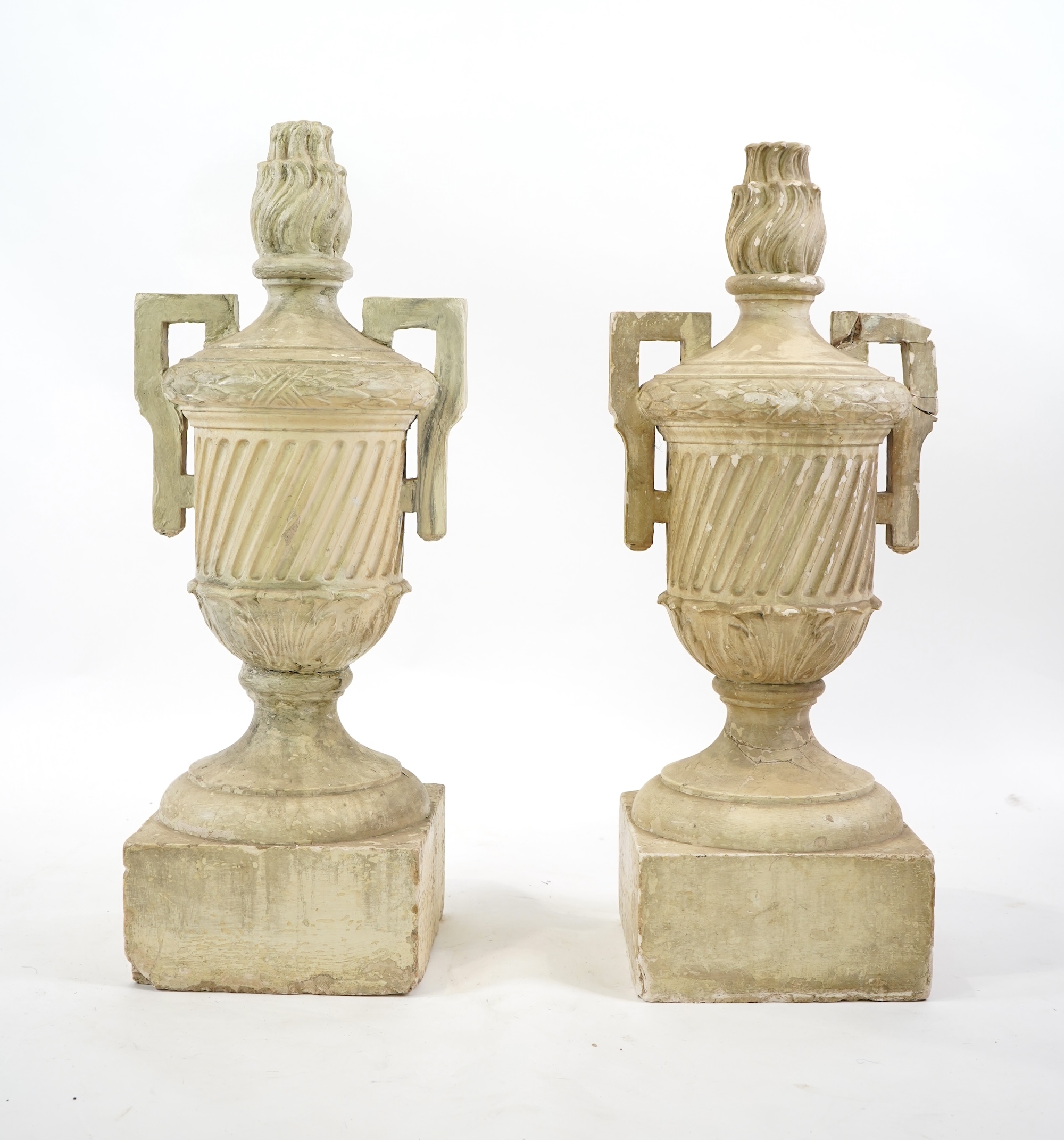 A pair of large 18th century style Italian cream painted plaster urns